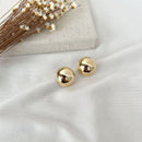BRINCO DOURADO MEIA ESFERA (2,5CM)