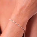 PULSEIRA AJUSTÁVEL DE RIVIERA CRISTAL (2MM) - BANHO OURO 18K