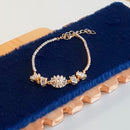 PULSEIRA FLOR COM CRISTAL CRAVEJADO - BANHO OURO 18K