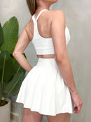 Conjunto Fitness em Poliamida Top Nadador e Shorts Saia Plissado Camila Ref. 1611